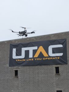 The PDW drone bearing the AeroVox payload takes to the sky, impressing bystanders with the loud and clear communication.